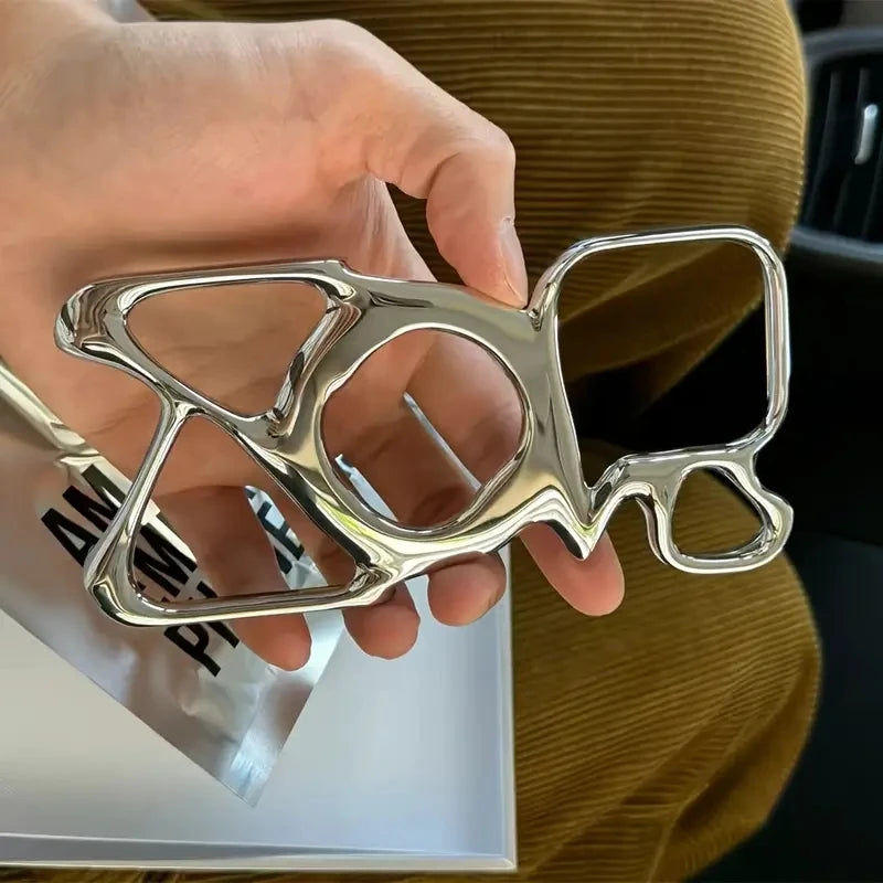 Hollow Electroplated Silver Magnetic Phone Case.